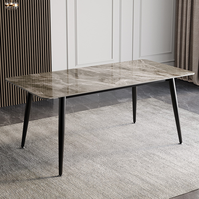 Bàn ăn mặt đá Ceramic chân côn bọc đồng AB002 trong không gian phòng ăn